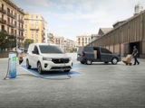 Nissan Townstar Electric Van on charge with a Townstar petrol parked behind