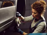 Volkswagen Technician working on a van